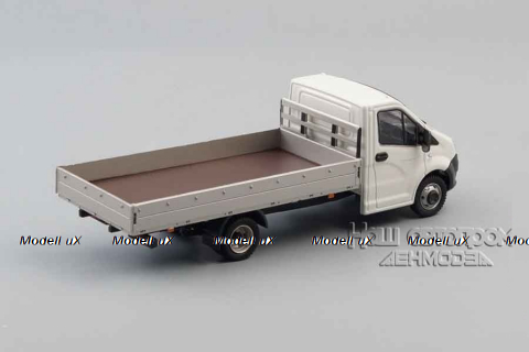 ГАЗель NEXT А21R23 длинный борт белый/серый Н559, НАП 1:43