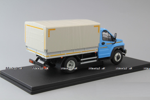 Газон NEXT C41R11 бортовой с тентом голубой/серый, НАП Н232 1:43