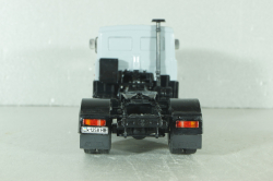 Маз-54323 тягач 1988г, серый, конверсия шасси - АвтоИстория, кабина НАП 1:43