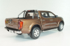 Nissan Navara (D23) 2017, brown met, Paudi 1:18
