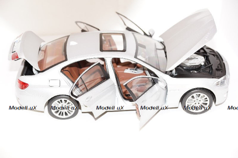 Ford Cortina MkIII 2000GT dark blue/mattblack 1973, Vanguards 1:43