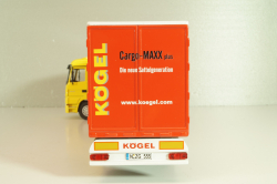 Mercedes-Benz Actros 1846 tractor with semi trailer "Cargo-Maxx" yellow/red, 555, NZG 1:50